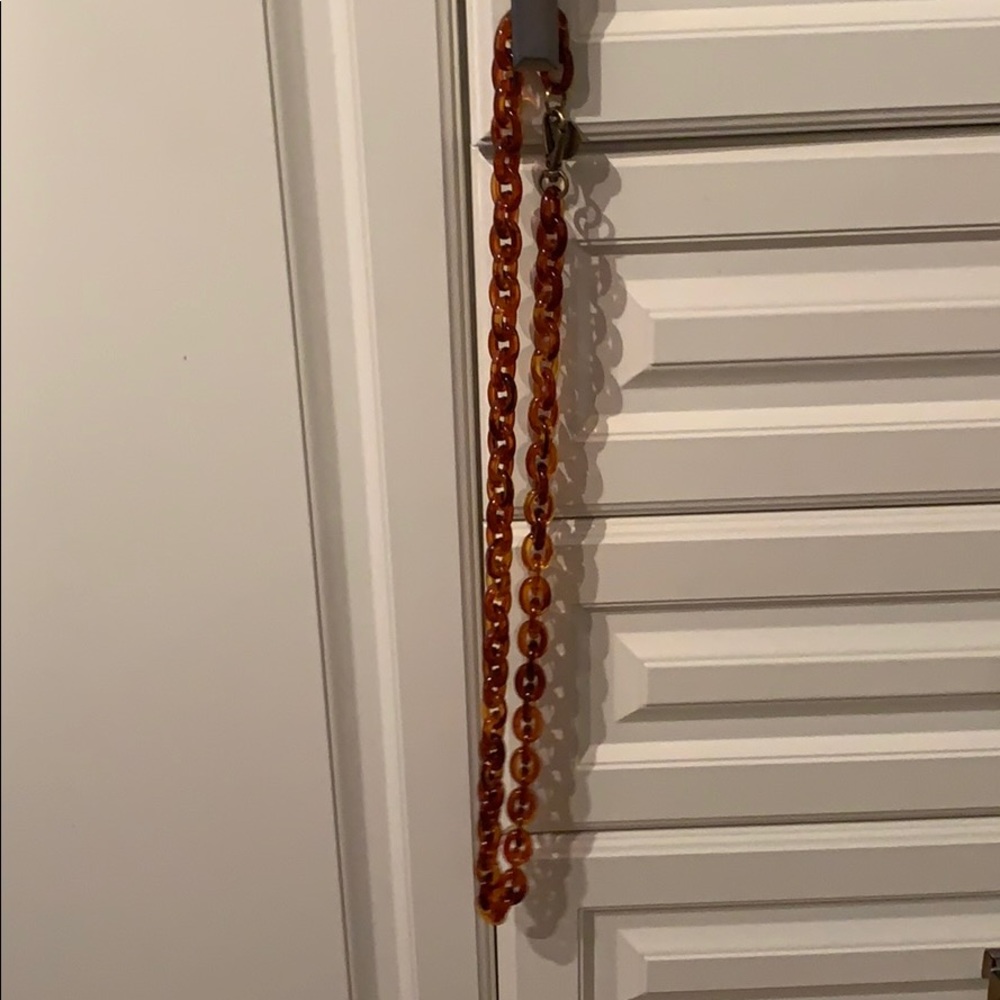 Brown tortoise chain belt with gold clasp